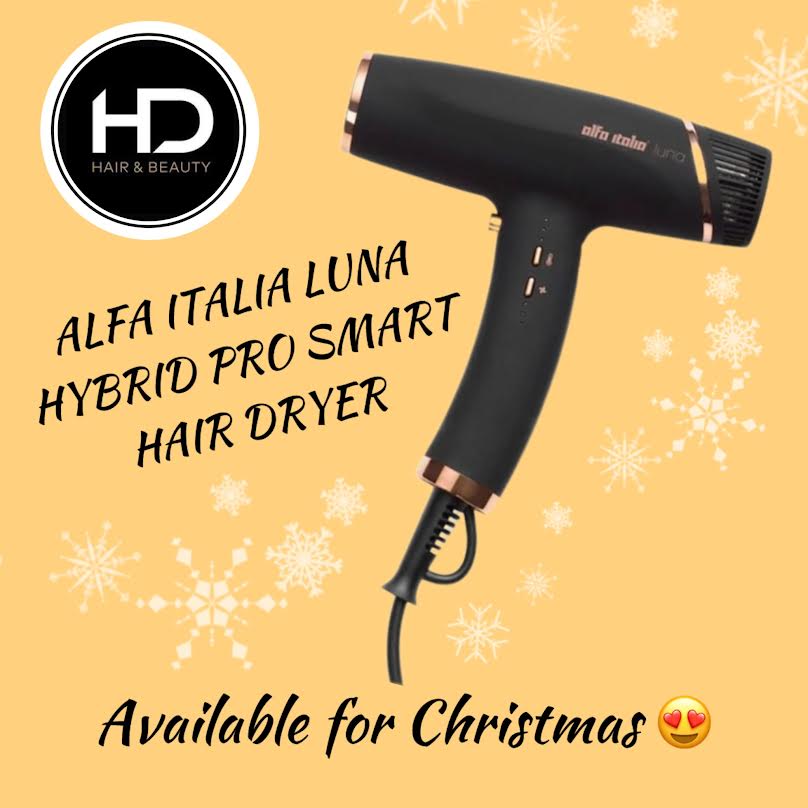 Alfa Italia Luna hairdryer on a gold background with snowfake details text saying available for Christmas HD Hair and Beauty logo in top left corner