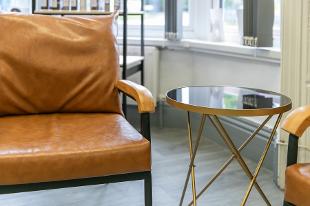 brown leather chair at hd hair salon